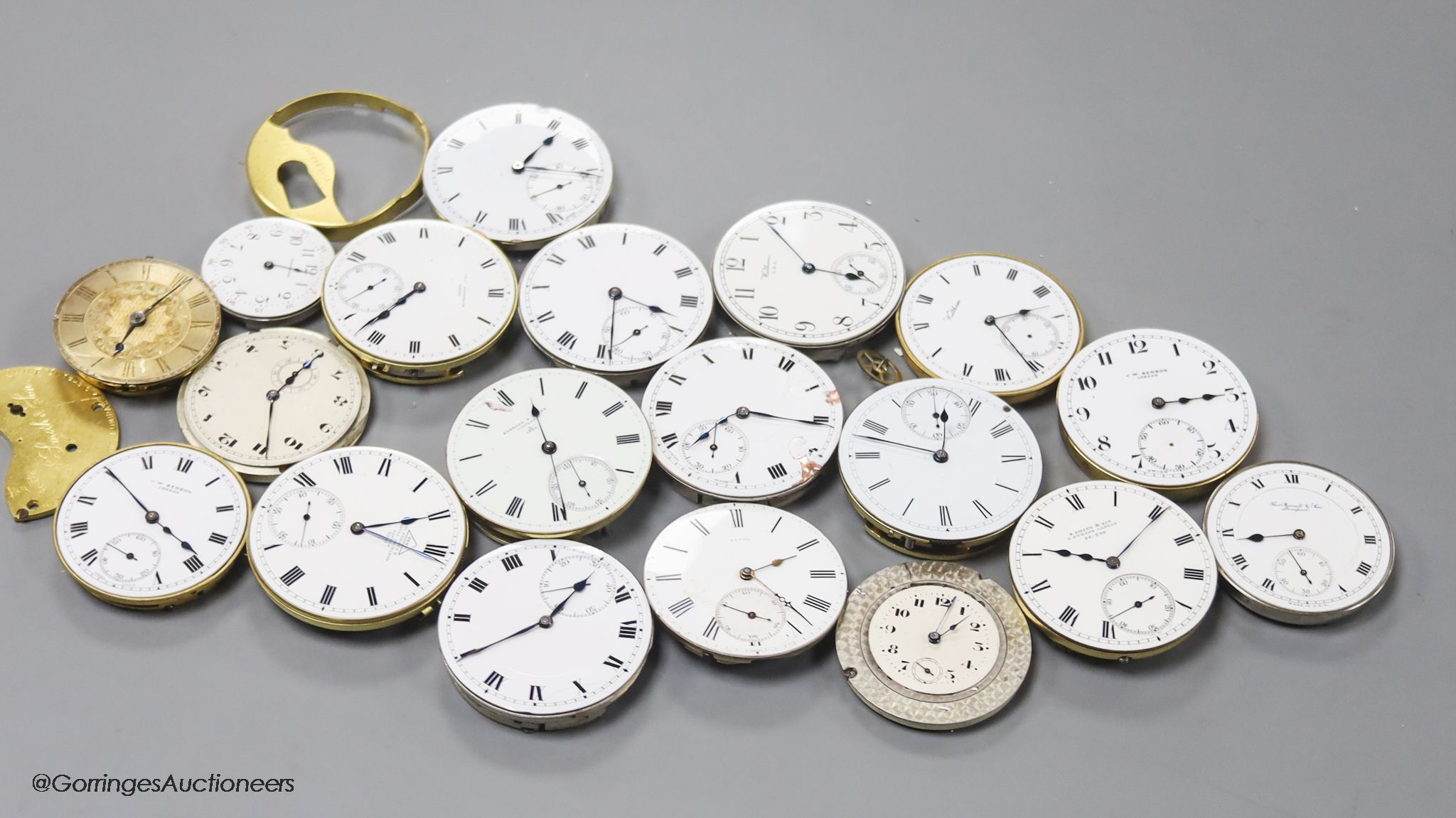 A small collection of assorted pocket watch movements, including Waltham & Tavannes.